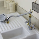 White ceramic vessel sink with chrome faucet