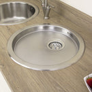 Stainless steel round sink with faucet mounted