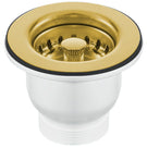 Gold-toned kitchen sink drain and strainer basket.