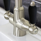 Under-sink plumbing trap and pipe assembly