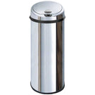 Chrome finish cylindrical countertop soap dispenser.