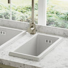 Glossy white ceramic farmhouse apron-front sink