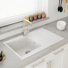 Close-up of gold kitchen faucet connection