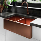 Copper-toned double-basin kitchen sink.