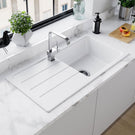 White farmhouse double sink with chrome faucet