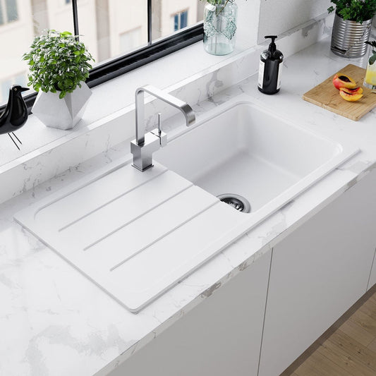 White farmhouse double sink with chrome faucet