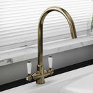 Brushed gold high-arc kitchen sink faucet
