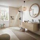 Chrome pull-out kitchen faucet installed on sink