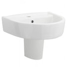 White ceramic pedestal basin with round bowl design
