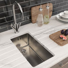 Worker using laptop for bathroom planning