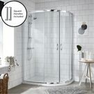 Glass shower enclosure with chrome frame and door