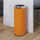 Orange cylindrical kitchen bin with steel lid