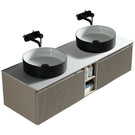 Pair of black granite undermount sinks with drains