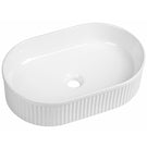 White round ceramic countertop basin front view