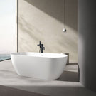 White ceramic countertop basin with chrome faucet