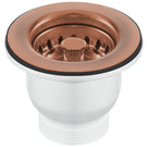 Copper-toned kitchen sink drain and strainer.