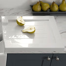 Close-up of gold kitchen sink waste kit