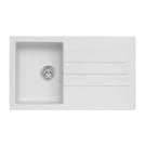 White kitchen sink with a drainboard on a white background