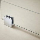 Chrome wall-mounted bath spout with modern design