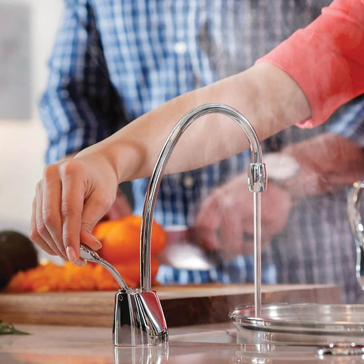 Plumber repairing pipes with wrench and gloves