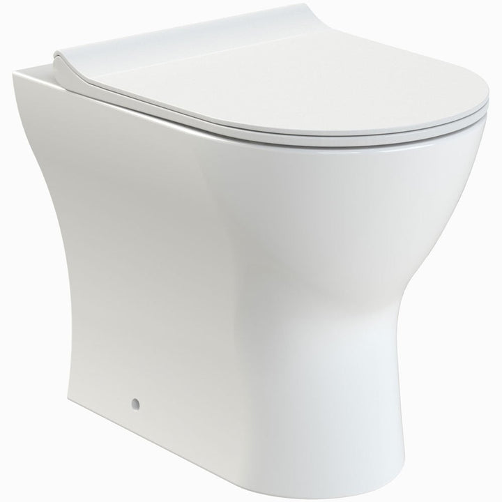 Compact pedestal basin for small bathrooms