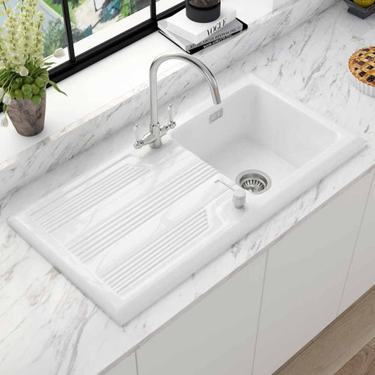 White undermount sink with chrome faucet
