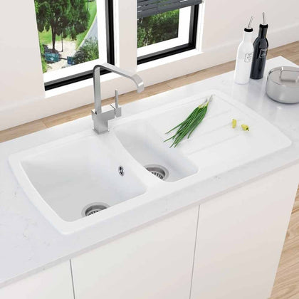 Modern double bowl sink with chrome mixer tap