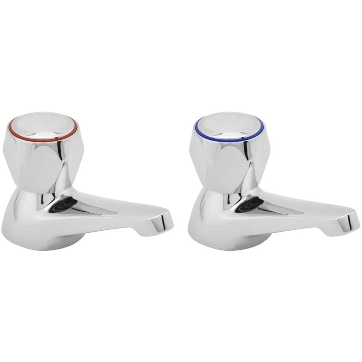 Pair of chrome basin pillar taps with round base