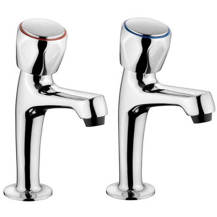 Pair of chrome dual handle pillar taps for basin